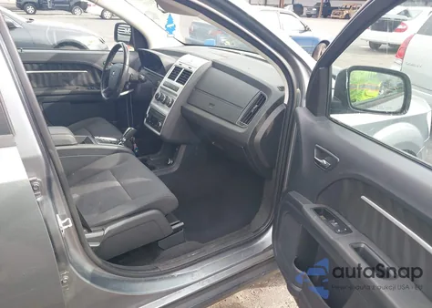 2010 Dodge Journey Sxt z USA, uszkodzony, nr VIN 3D4PG5FV7AT145487